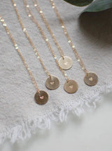 gold necklace with tiny heart