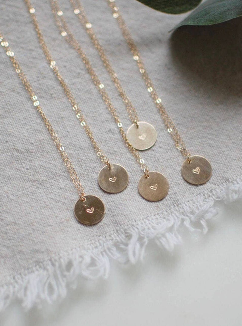 gold necklace with tiny heart